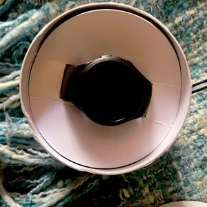 Samsung gear 2, only thing missing is the charger also has extra band.